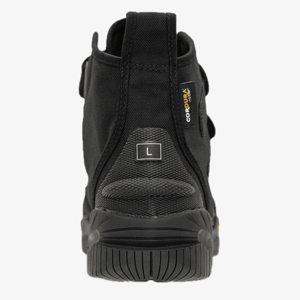 Black boot with a visible brand logo on a white background