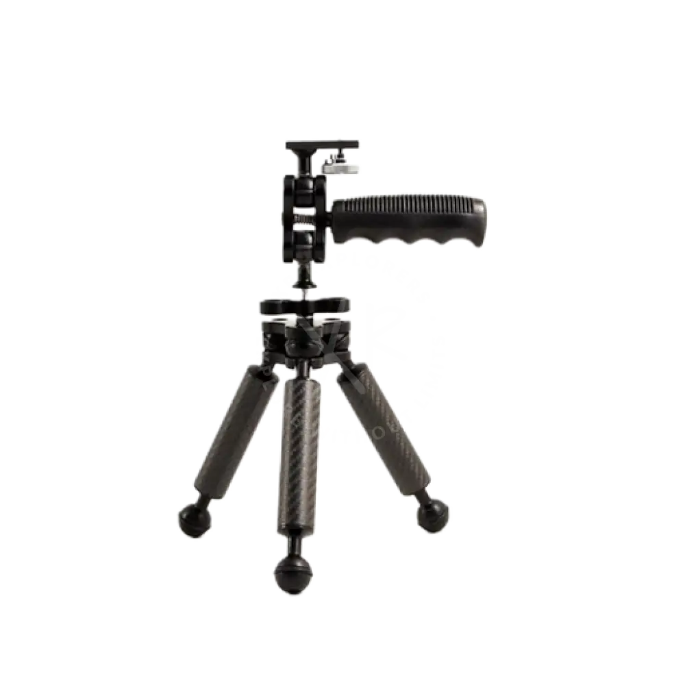 Black carbon arm tripod with handle and ball head featuring textured grip surfaces on legs for stable support