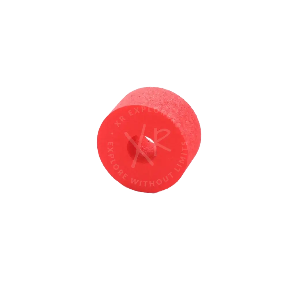 Bright red cylindrical foam roller with a central hole for lightweight 150g floating ring exercise and therapy use