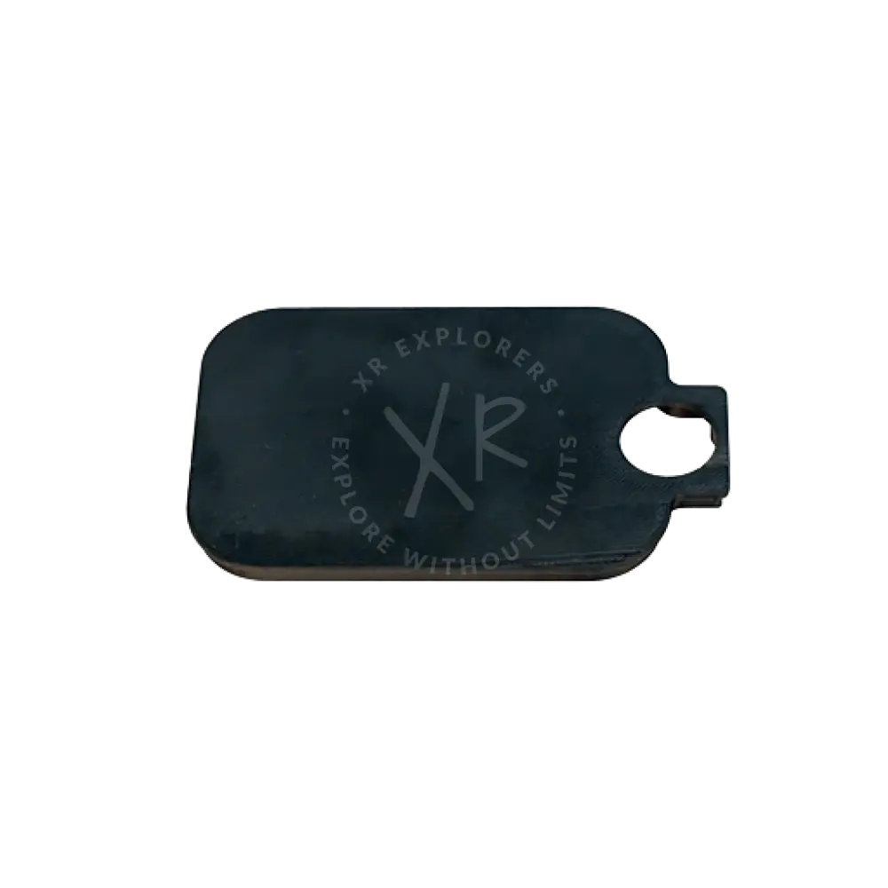 Black rectangular dog tag protection cup with rounded edge and circular hole for action cam housing protection