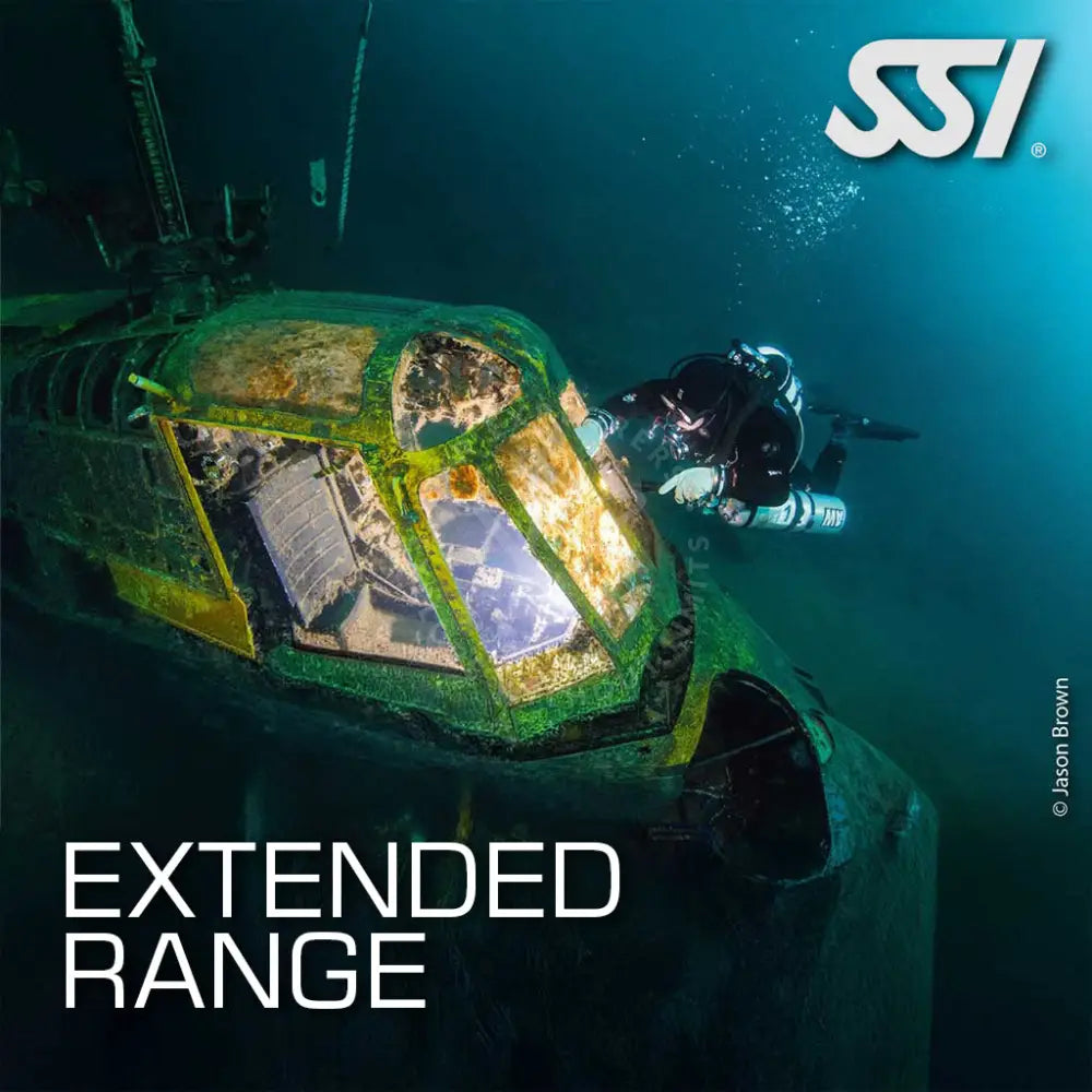 A promotional image featuring a diver underwater with a trimix blend gas cylinder, with the text 'EXTENDED RANGE' and 'Trimix Diver' prominently displayed.