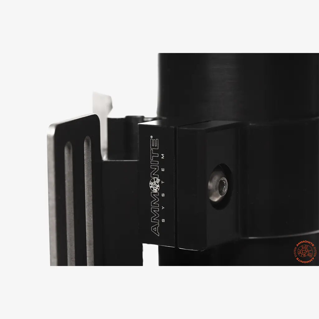 Black matte-finished ammonite system mount bracket accuclick mount with sleek angular design and engraved branding