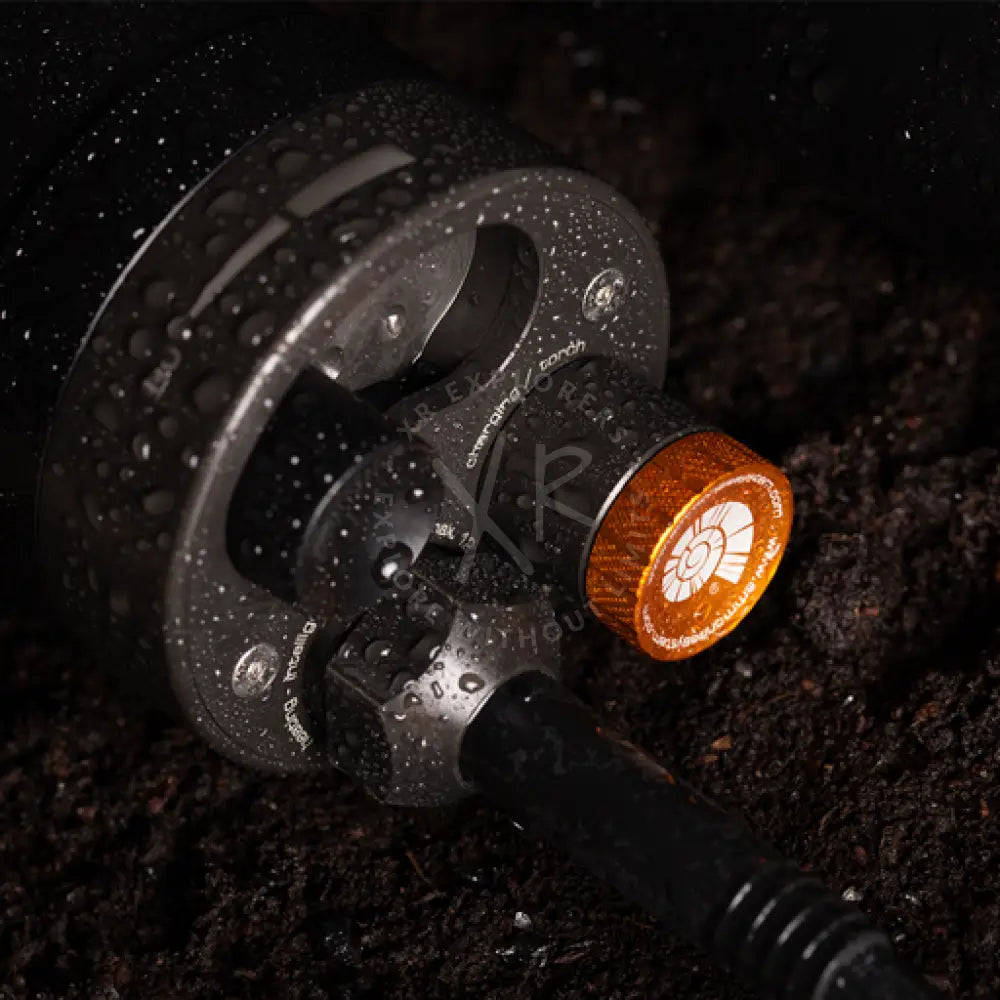 Accu thermo type 24 black and orange waterproof flashlight with textured grip and spiral pattern on the head