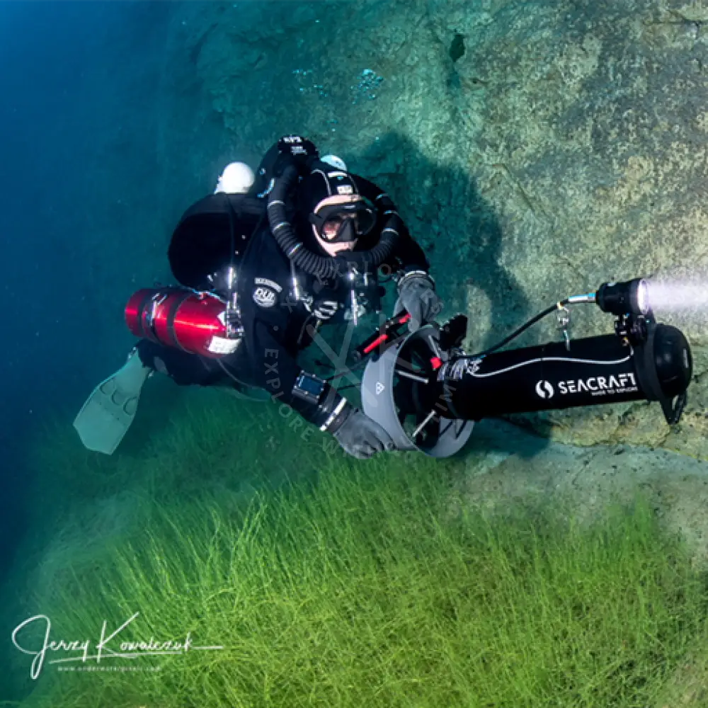 Black seacraft ball mount underwater camera rig with red and white accents designed for secure attachment