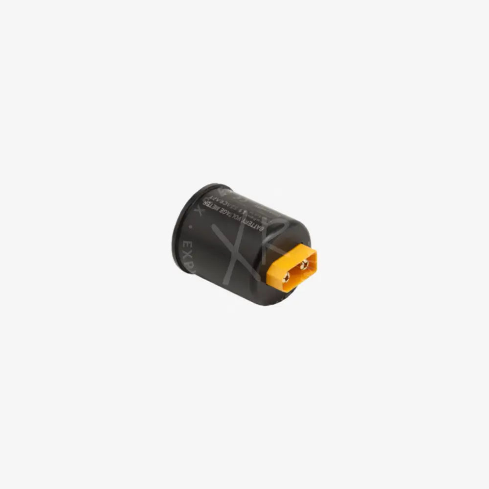 Black cylindrical battery with bright yellow connector for battery voltage meter use
