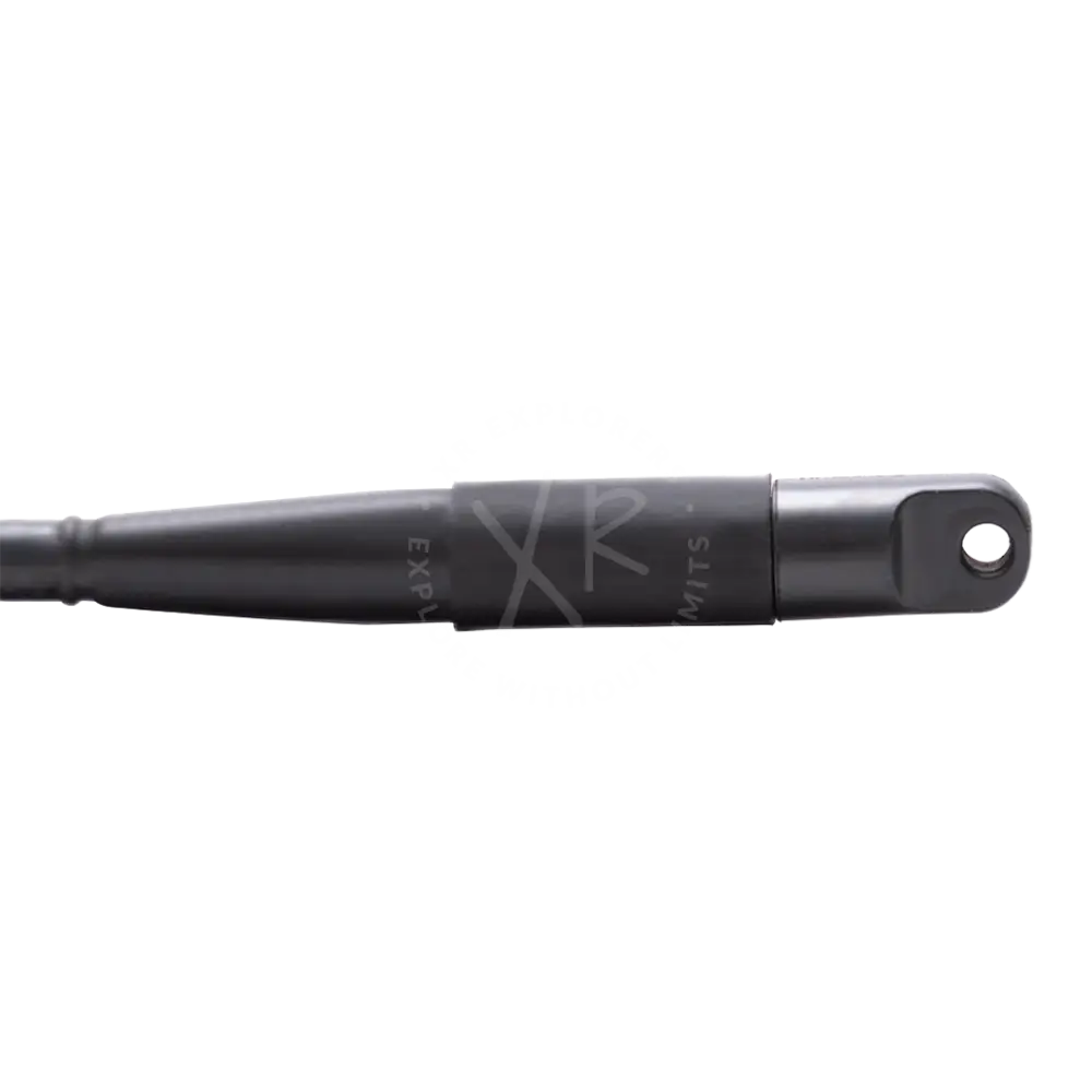 Black metal gas spring with cylindrical body and threaded end used as blind plug for e o cord
