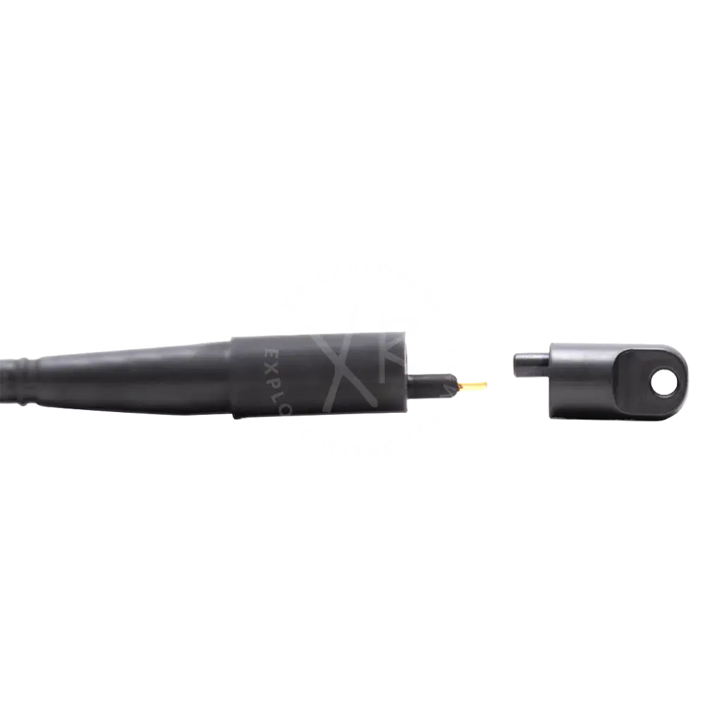 Black cylindrical blind plug for e o cord with metallic tip and cap featuring a sleek matte finish