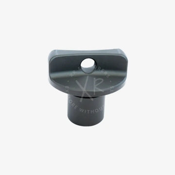 Gray plastic cap nut with circular hole and cylindrical base for secure fastening and easy installation