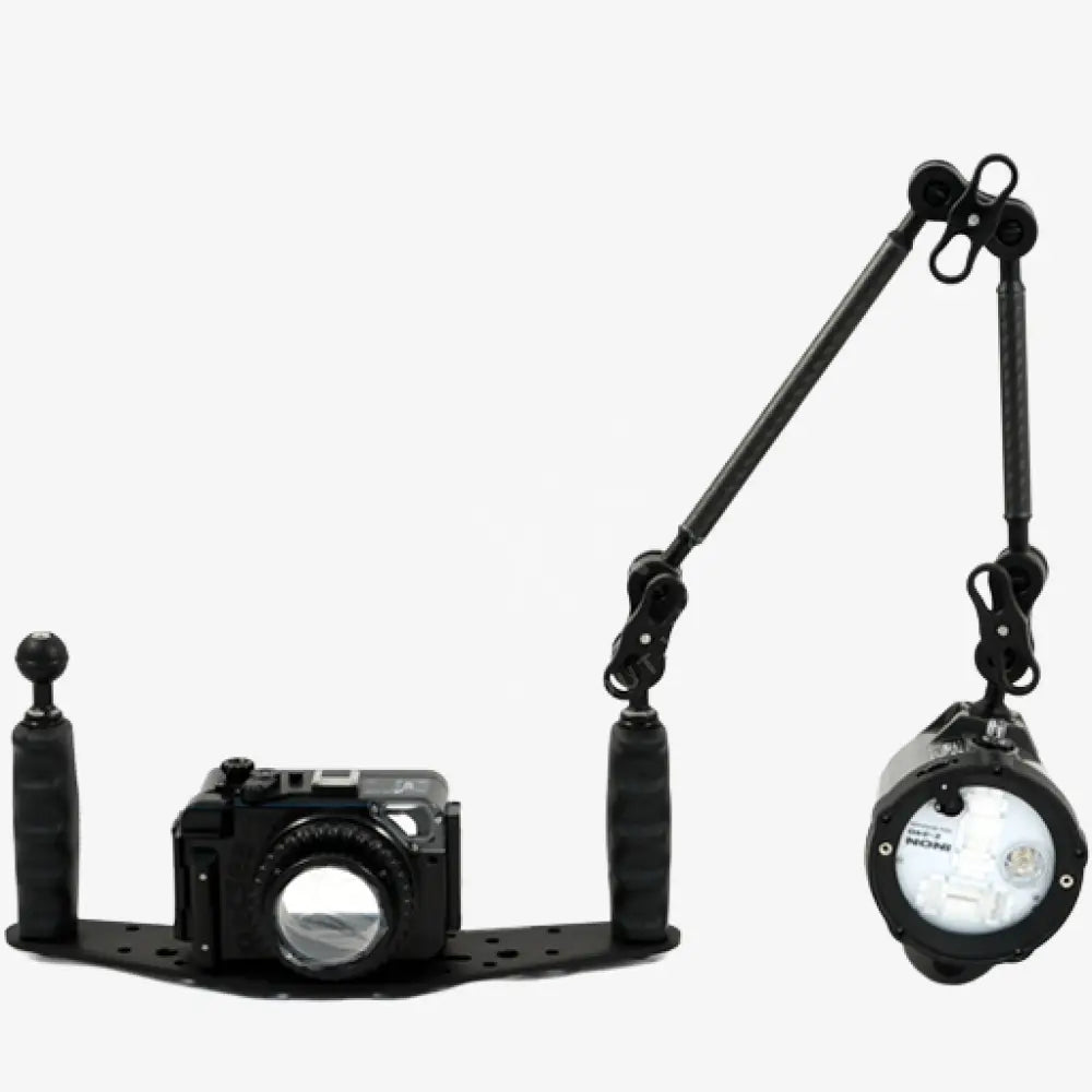 Black underwater camera rig with carbon arm slim articulated arms and mounted flash unit for underwater photography