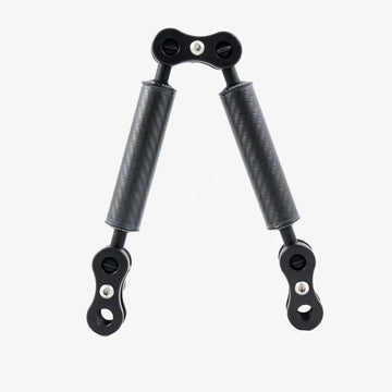 Black carbon fiber handlebar grip extender with metallic hardware from carbon arm standard kits visible from back side