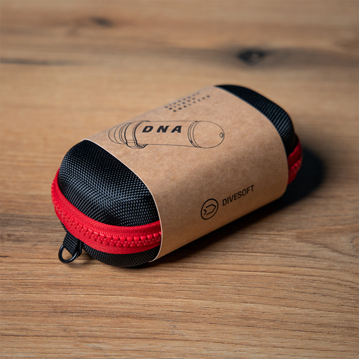 Divesoft DNA analyzer in palm of hand showing ultra compact size for travel