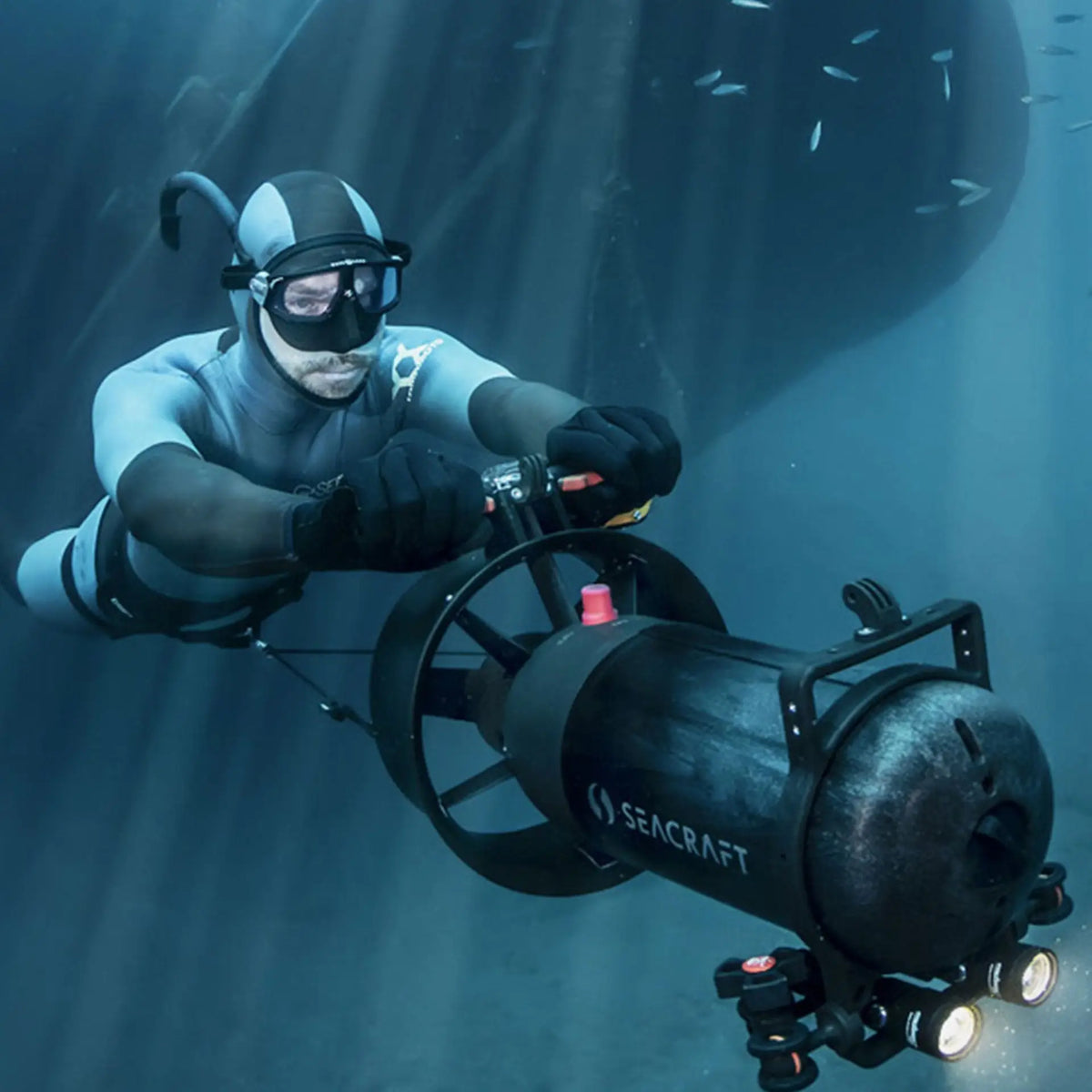 Black dpv diving seacraft underwater vehicle with illuminated lights and circular wheel design for exploration