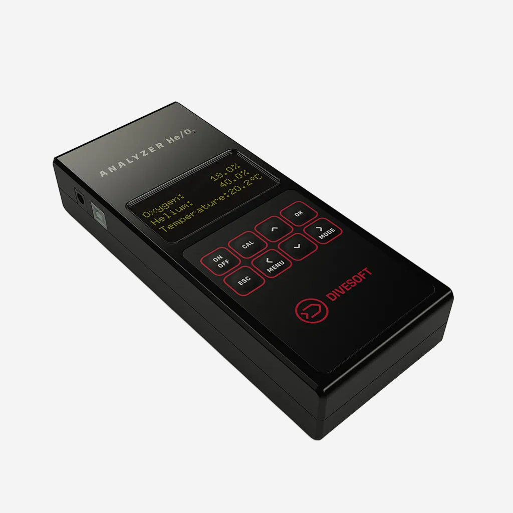 A black Divesoft He/O2 Analyzer with a digital screen and several buttons, displaying readings in percentages.