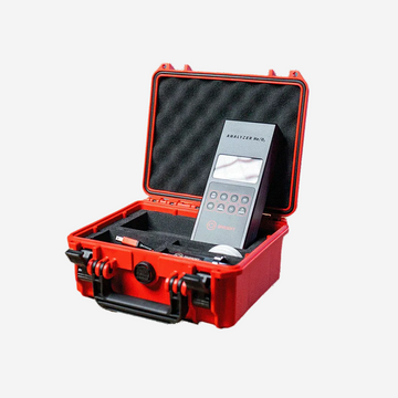 A professional gas analyzer set in a red waterproof transport case, with a digital display and various accessories like a flow limiter and connection hose.