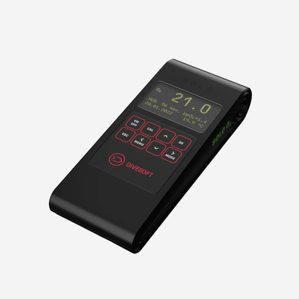 A Divesoft SOLO O2 oxygen analyzer with a digital screen displaying a reading, housed in a black casing with red detailing.