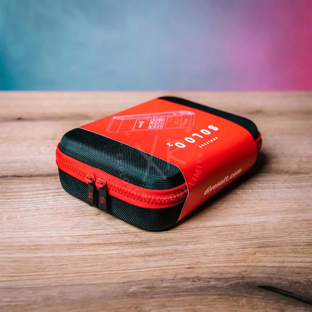Red and black zippered carrying case for divesoft analyzer solo o2 nitrox analyzer with divesoft branding on side