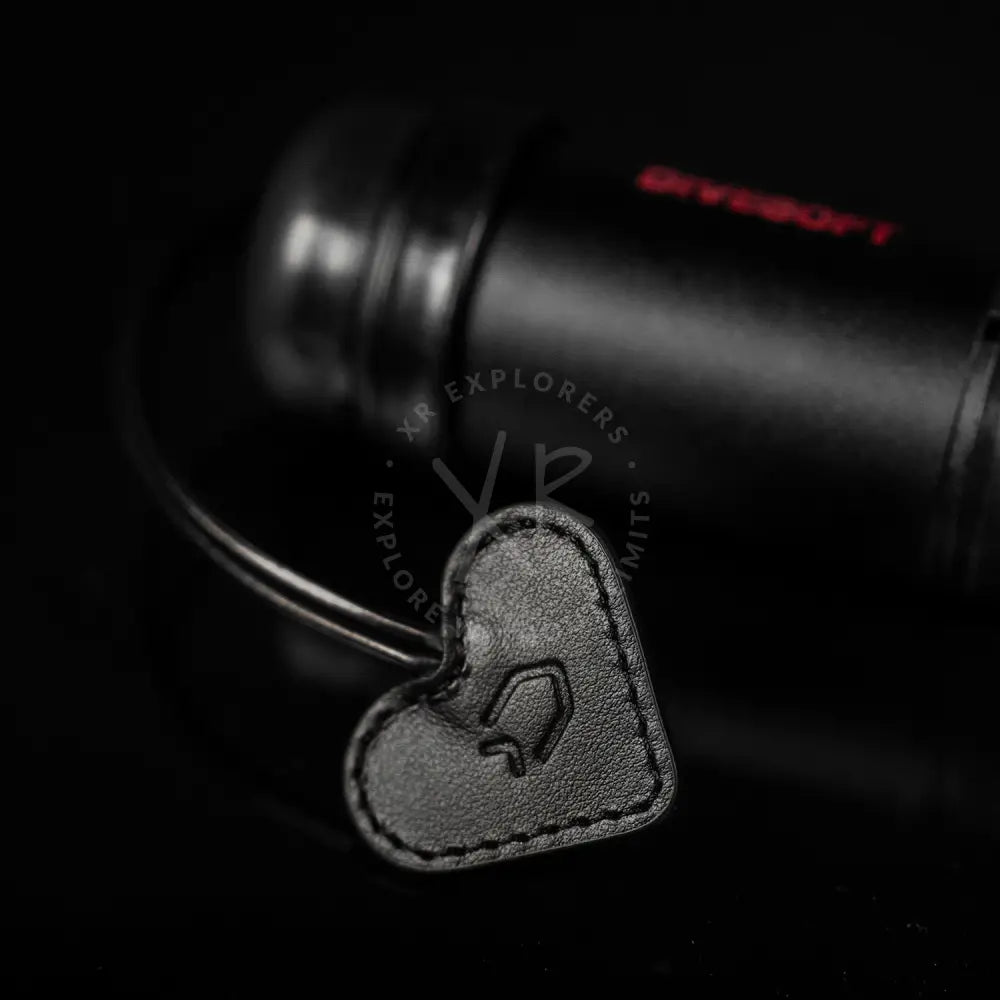 Black leather heart-shaped keychain with stitched edges and embossed logo for divesoft dna nitrox analyzer bluetooth
