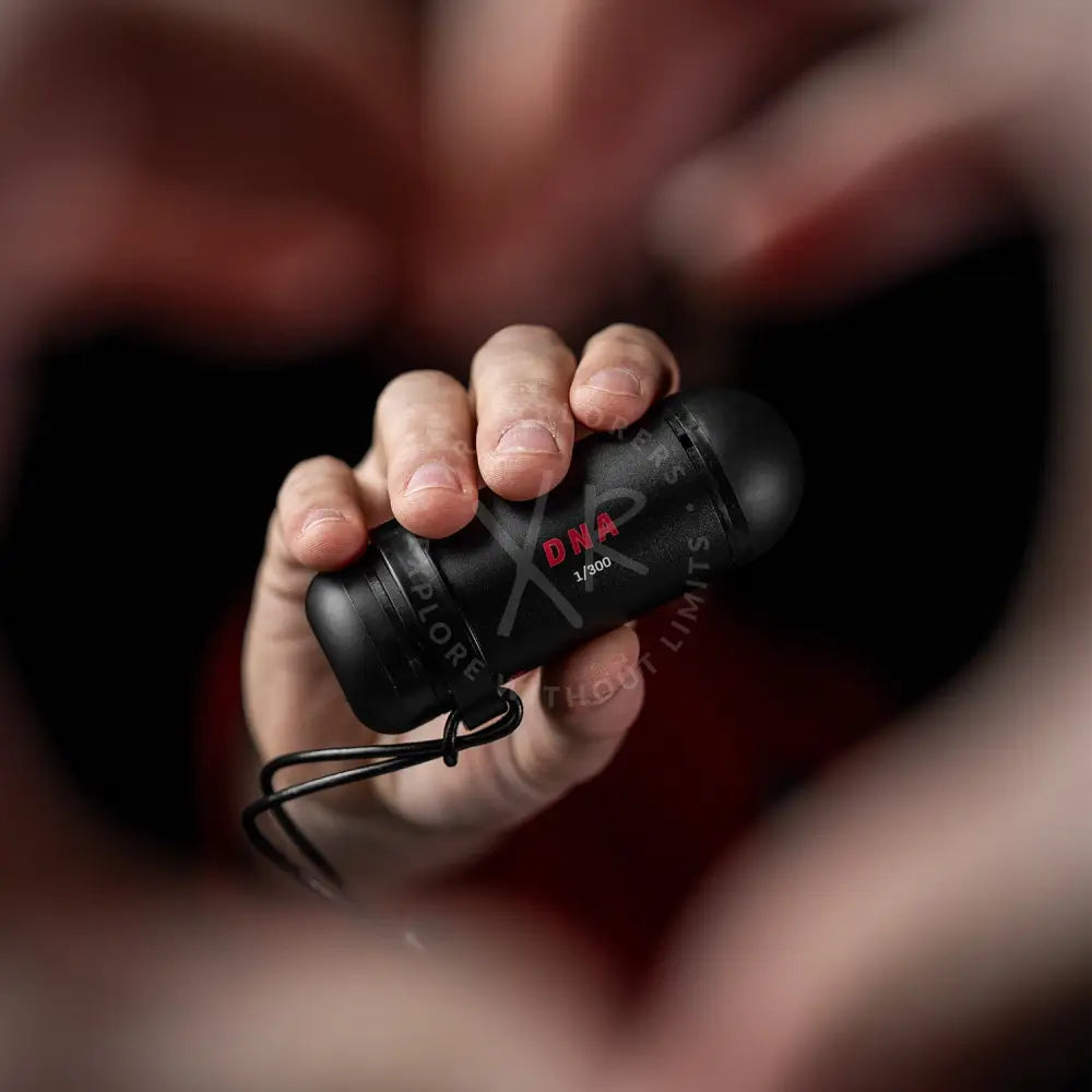 Black cylindrical dna case with red lettering and black cord for divesoft dna nitrox analyzer bluetooth device