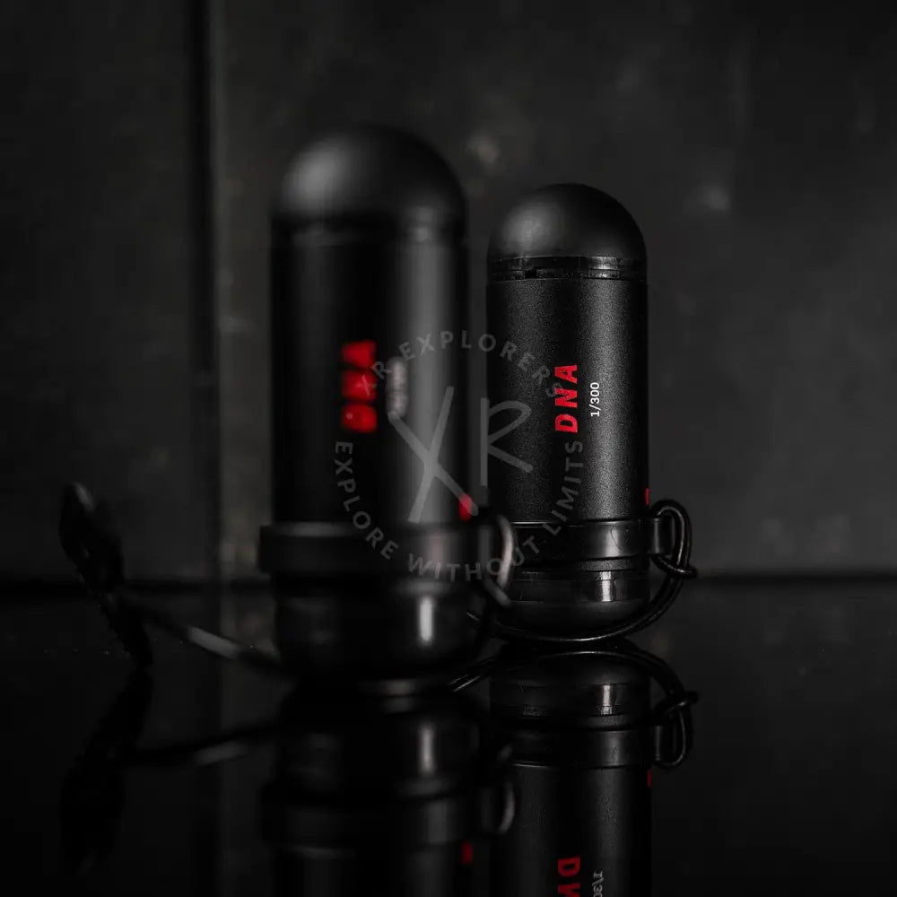 Black cylindrical portable charger with red dna and 1/300 branding for divesoft dna nitrox analyzer bluetooth device