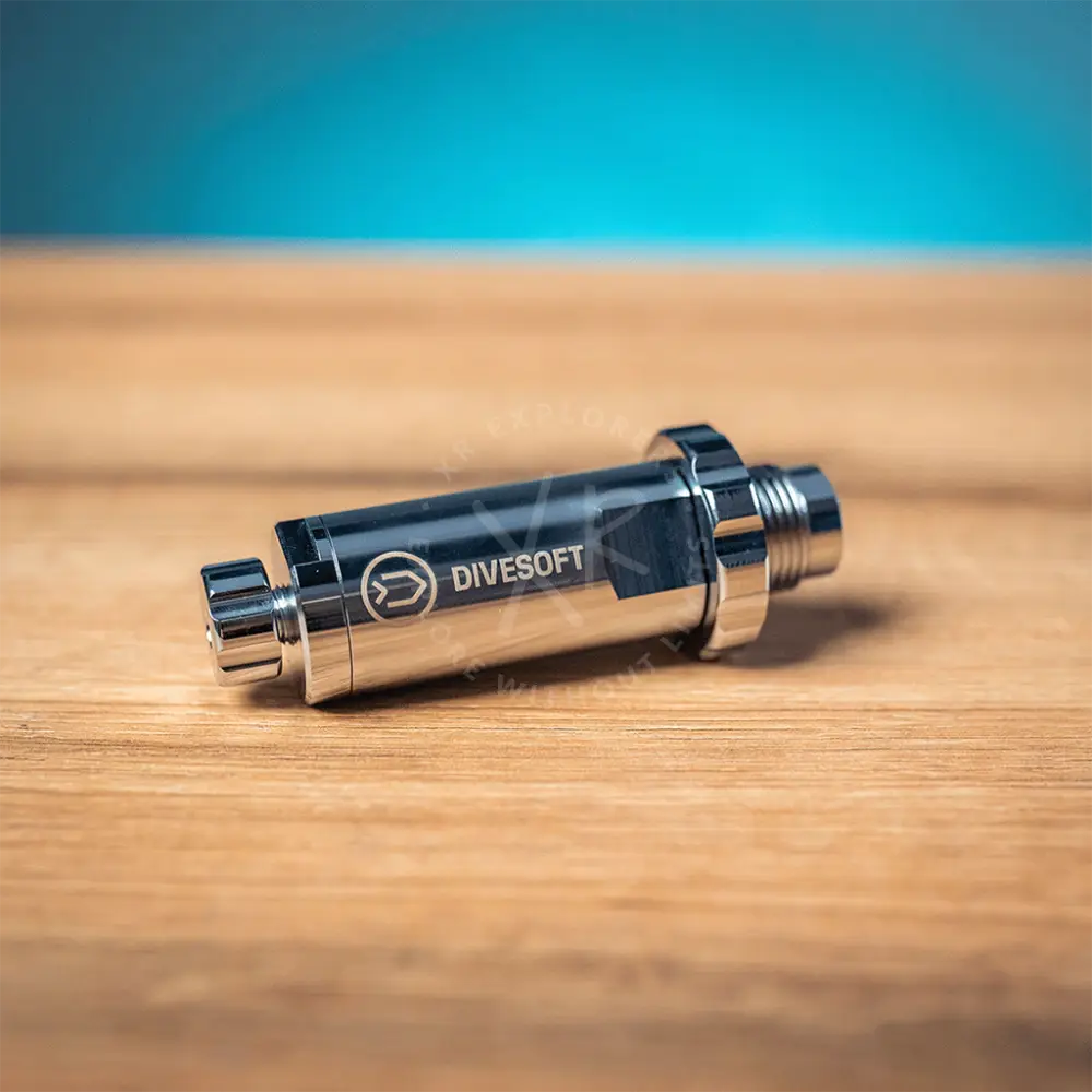 A sleek metallic divesoft professional flow limiter mk2 with brushed chrome finish and black accents for diving gas control