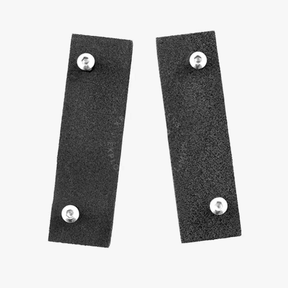 Black rectangular leather straps with silver metal rivets for floating kit support moby product accessory