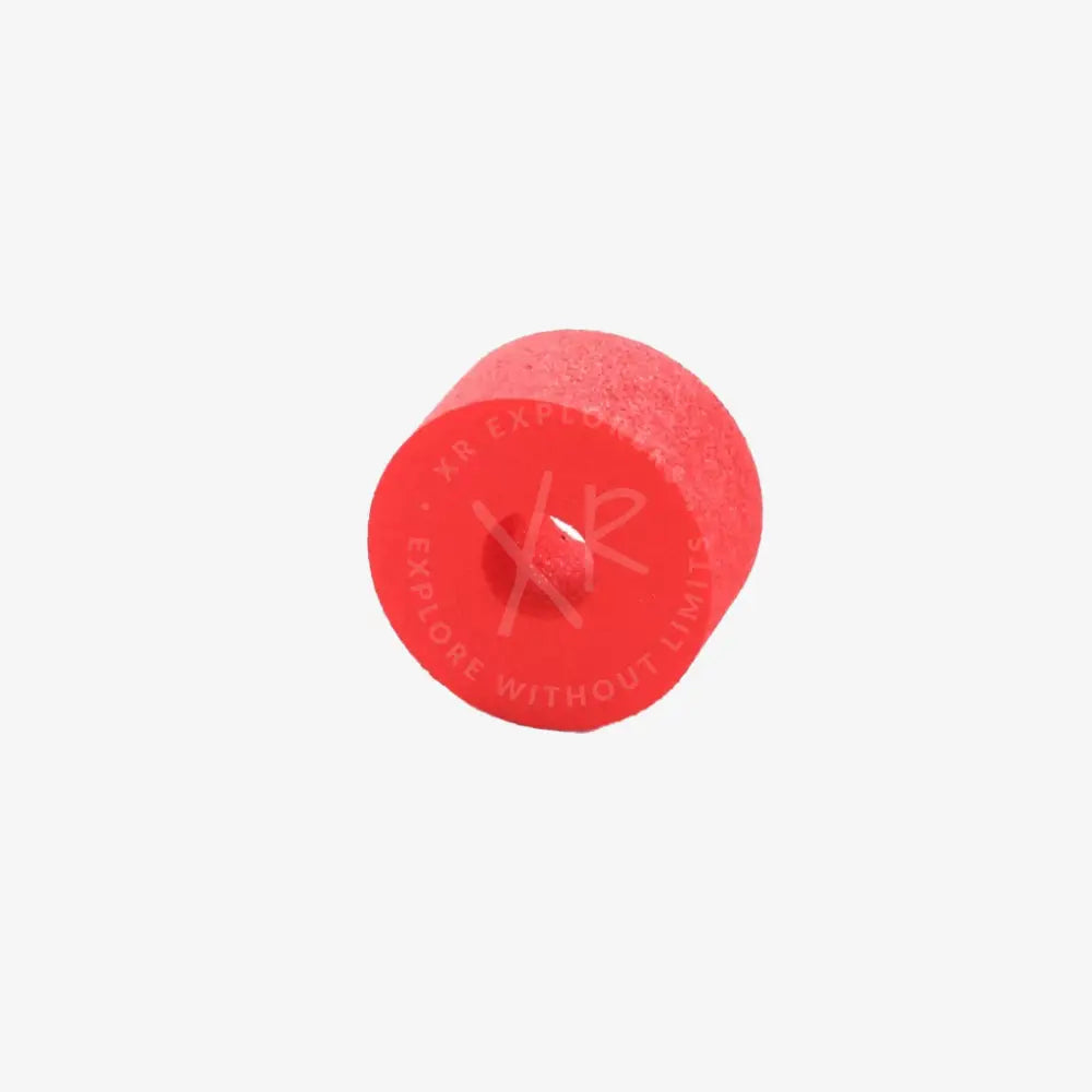 Bright red cylindrical foam roller with a central hole for lightweight 150g floating ring exercise and therapy use