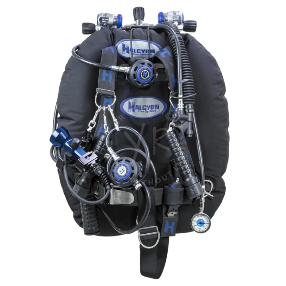 Black halcyon dive buoyancy compensator with blue accents and multiple gauges for full DIR gear setup
