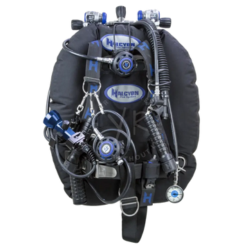 Black halcyon dive buoyancy compensator with blue accents and multiple gauges for full DIR gear setup