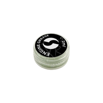 A small clear plastic container with black lid holding 2ml of go drive system grease for engine lubrication