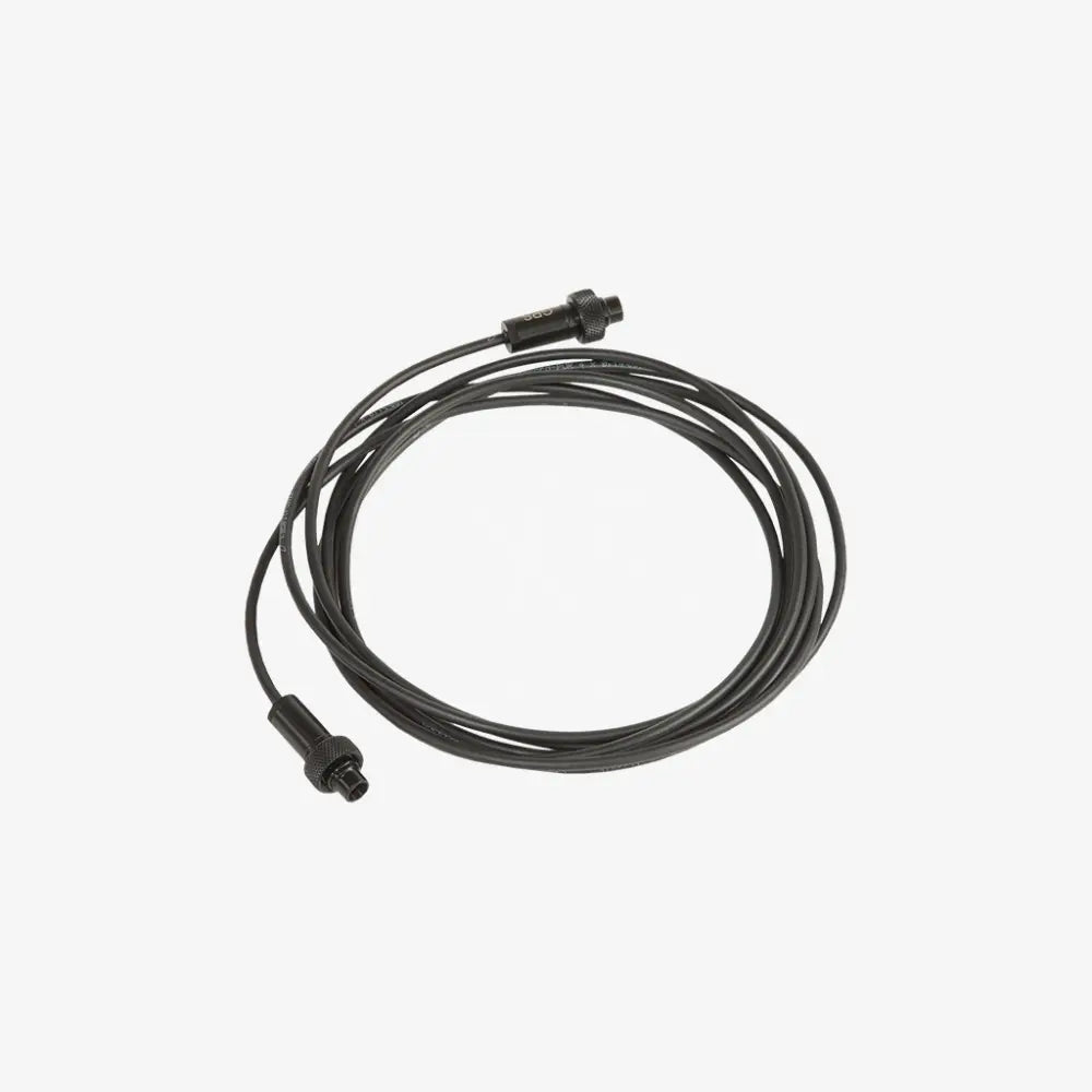 Black coiled gps type b connecting cable with two metallic connectors for reliable device connection