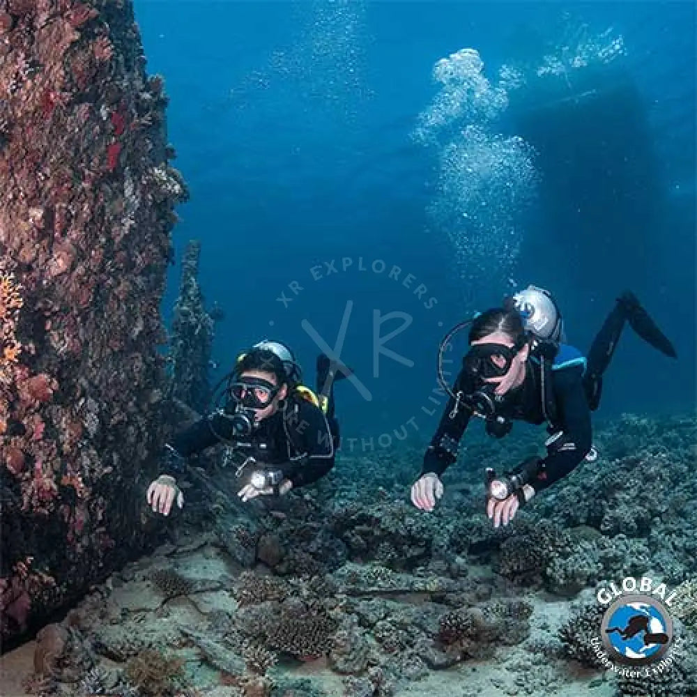 GUE instructor guiding a student in proper horizontal trim during discover diving session in Kuwait