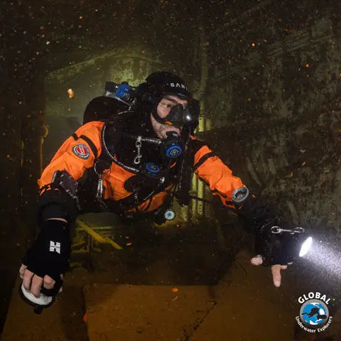 GUE Drysuit Primer student demonstrating perfect horizontal trim in a drysuit in wreck