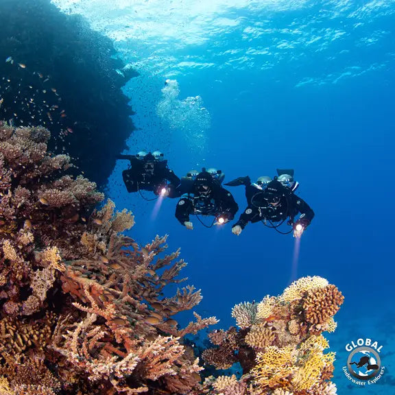 GUE Dive team practicing unified ascent procedures and communication in red sea with XR Explorers training in GUE performance diver course 