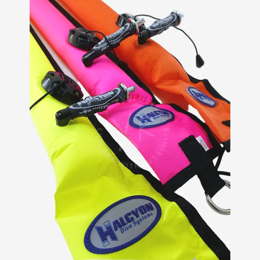 Halcyon closed circuit SMB 1m inflatable buoyancy aids in neon yellow pink and orange with black trim and branded patches