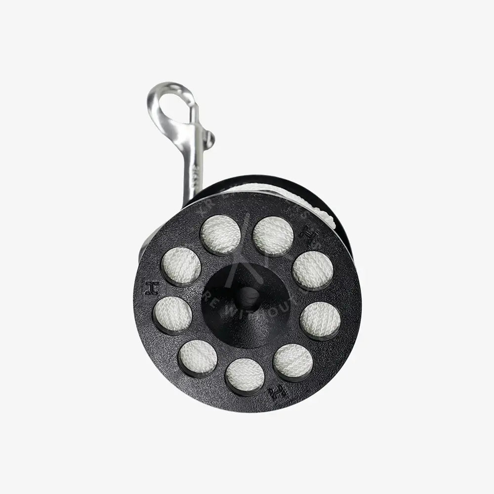 Black metal reel with silver clip on a white background