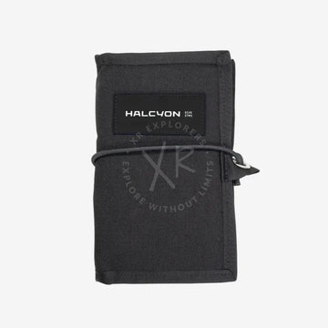 Black wallet with 'HALCYON' branding on a white background