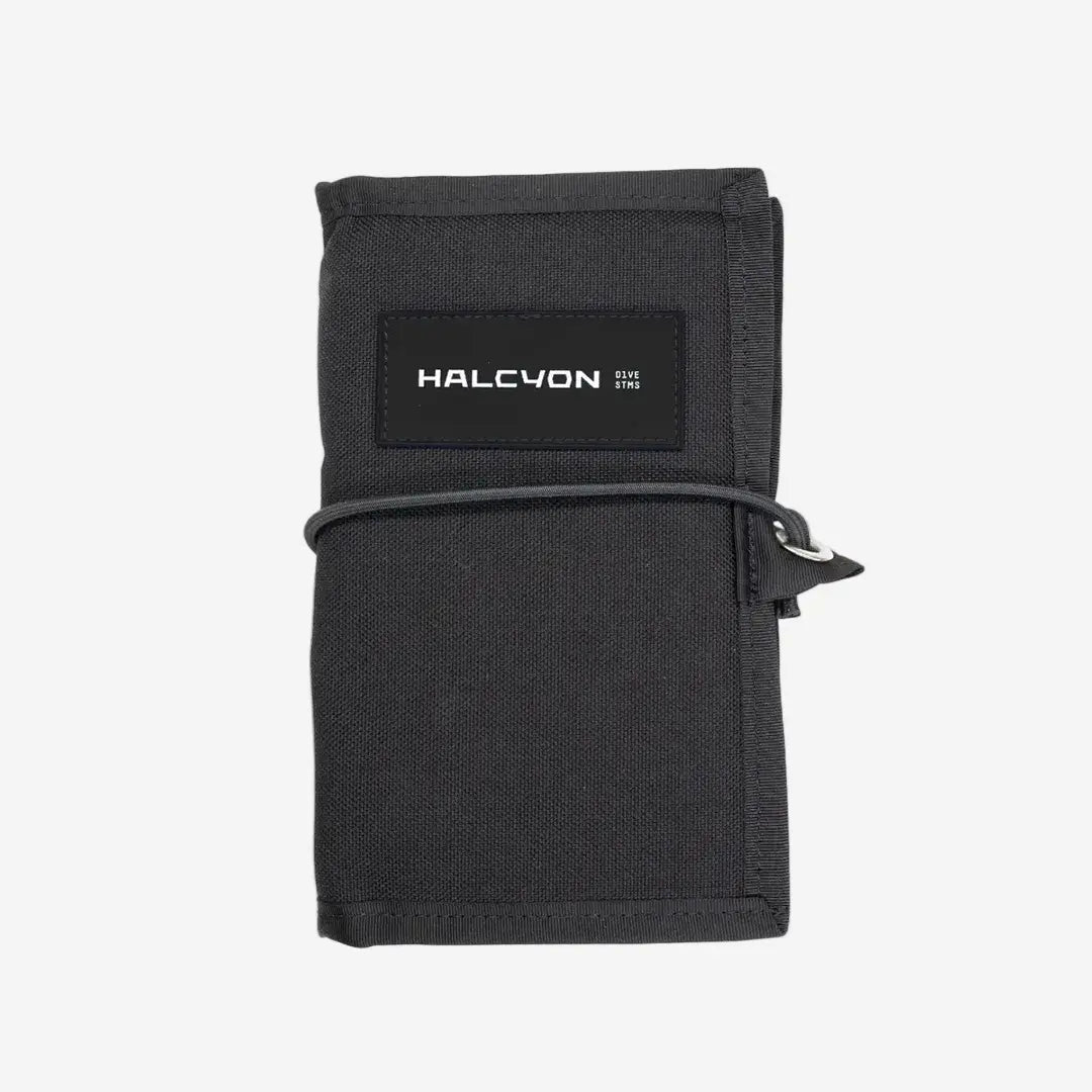 Black wallet with 'HALCYON' branding on a white background