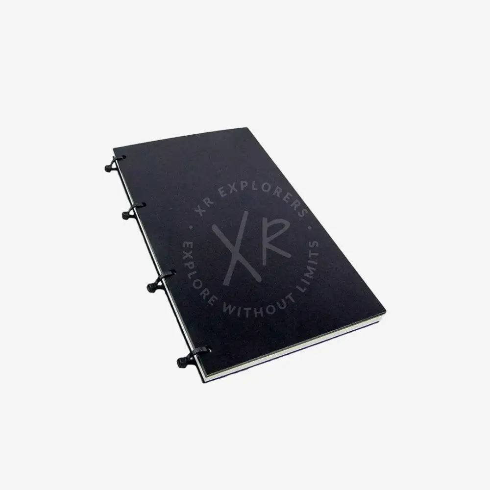 Black notebook with ring binding on a white background