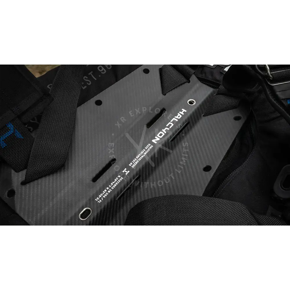 Black carbon fiber halcyon racing harness plate with white branding and mounting holes for halcyon era pro bc system