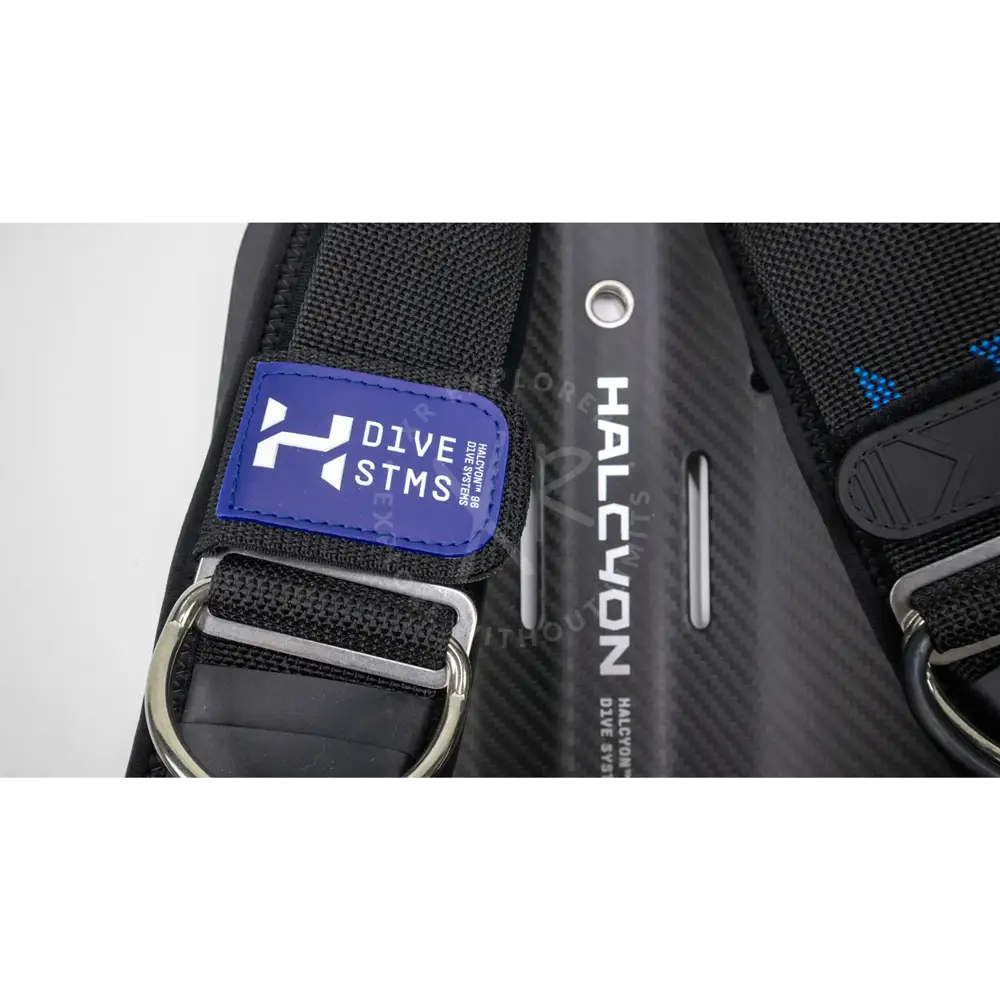 Black carbon fiber halcyon era pro single cylinder bc system dive harness with blue branded patch and silver hardware