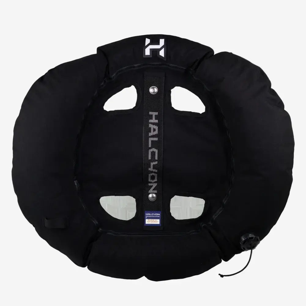 Black halcyon inflatable tire snow tube with central strap branded halcyon and silver-toned hardware for winter fun