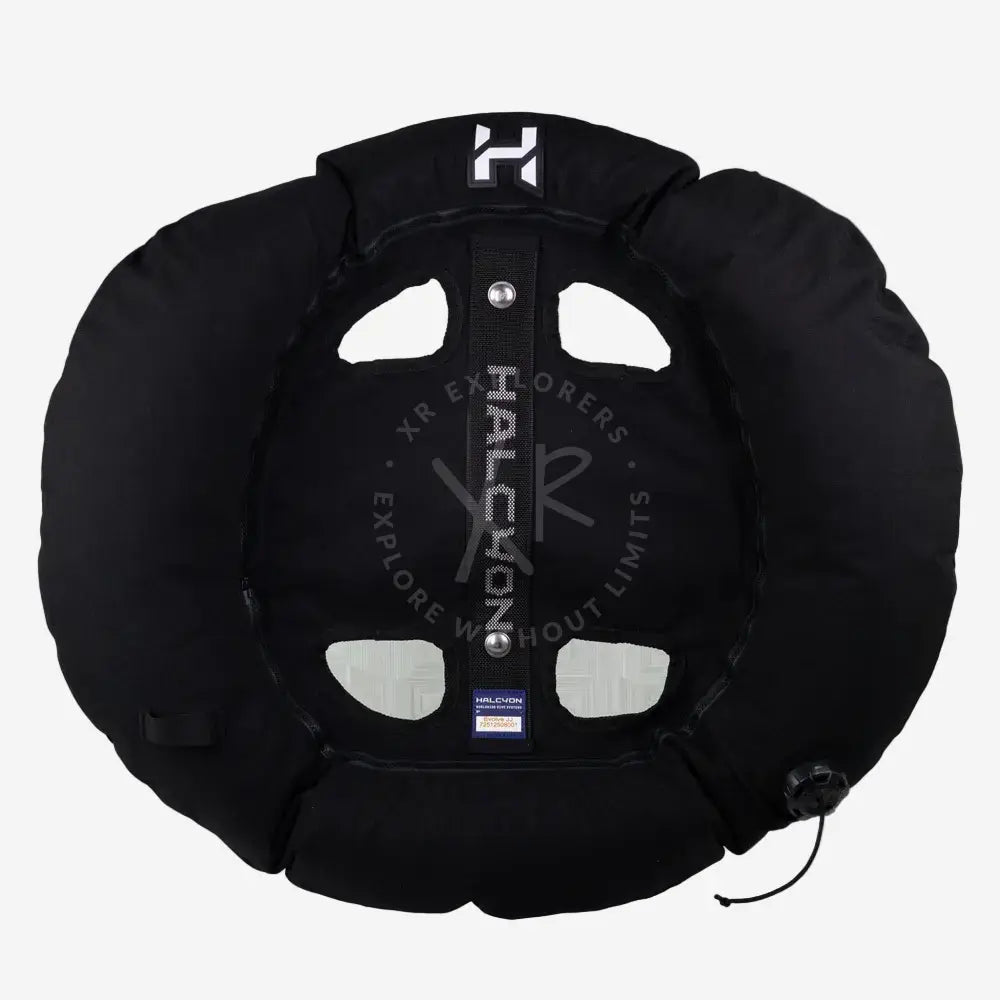 Black halcyon inflatable tire snow tube with central strap branded halcyon and silver-toned hardware for winter fun
