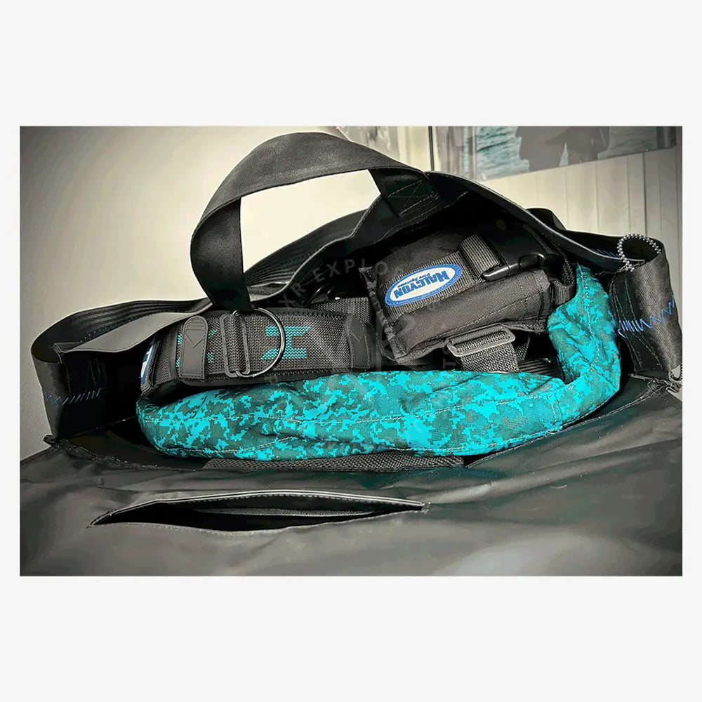 Black tactical-style duffel bag with teal camouflage lining and reinforced straps for halcyon legend mk2 pro double cylinder bc system carbon fiber