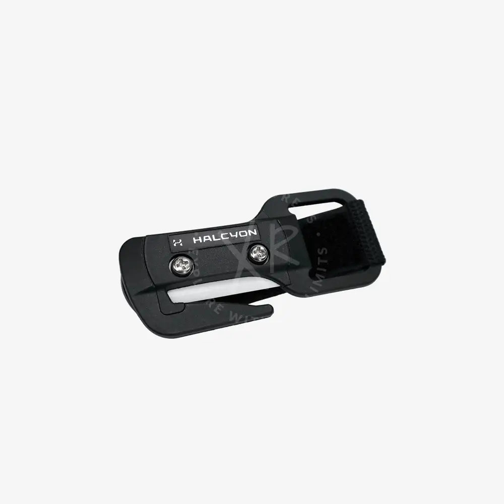 A Halcyon line cutter with black handle and sheath, designed for diving, with the brand name visible.