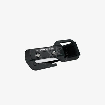 A Halcyon line cutter with black handle and sheath, designed for diving, with the brand name visible.