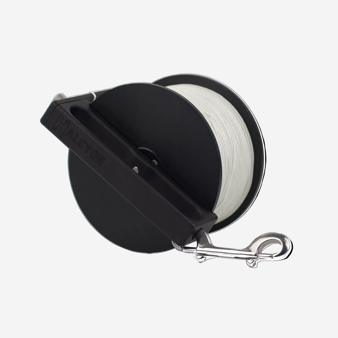 Black reel with white line and metal clip on a white background