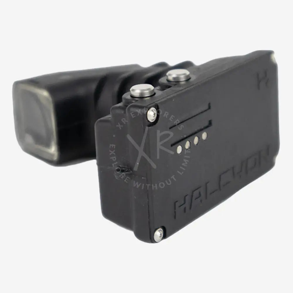 A black Halcyon Symbios Head-up Display for diving, featuring a micro display and control buttons.