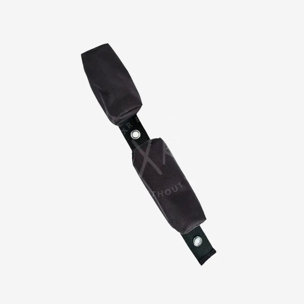 Black seat belt cover on a white background