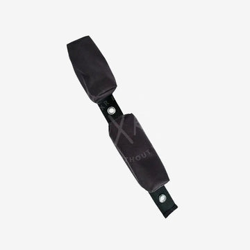 Black seat belt cover on a white background