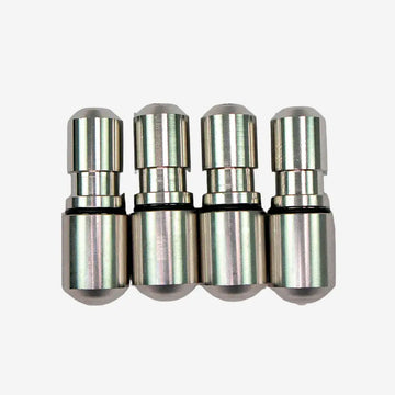 A set of four silver-colored metal weights with O-rings, arranged side by side.